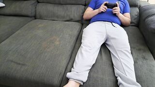 Stepsister sucks stepbrother and eats his sperm while he plays video games