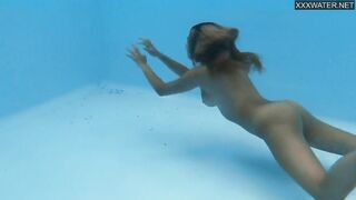 Irina blonde big boobs and booty teen swims underwater and undresses
