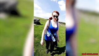 Busty redhead mature shows off her big boobs while out on a hike