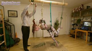 Girl in chicken wing (Tenshi harness) suspension