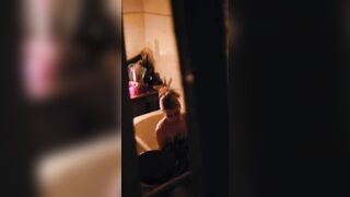 Voyear camera filming my hot stepmom while she takes a bath