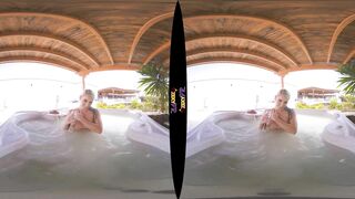 Sexy blonde naked in hot tub