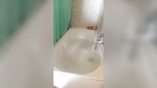 Wet clothes fan request in bathtub with bubbles and soap