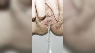 Hairy pussy pissing close up with toilet splashing