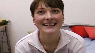 Short haired German shut pleasing her pierced pussy in the bedroom