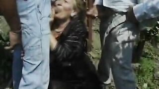 Wild German lady gets fucked by three hard and loaded cocks outdoors