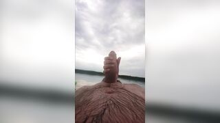 My wife jerks my cock with a happy ending in the inflatable boat on the lake