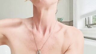 Horny 52 Cougar with amazing tits playing with her nipples until she cums in her bath.