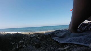 swimming at a nudist beach in Santorini Greece