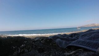 swimming at a nudist beach in Santorini Greece