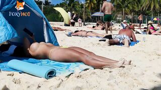 I love sunbathing topless