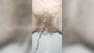 Sensual Slow Motion Piss by Mega Hairy Pussy Up Close