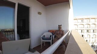 Mutual masturbating on balcony