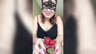 Sticking strawberries in her vagina & eating cream from her vagina.