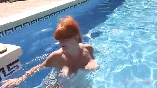 AuntJudys - Busty Mature Redhead Melanie Goes for a Swim in the Pool