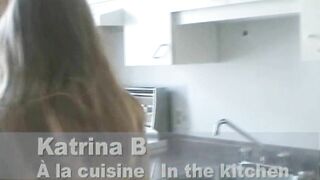 Katrina having her pussy wet in her kitchen