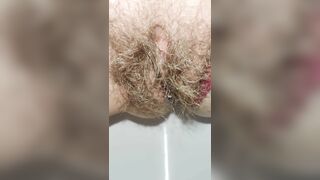 Schoolgirl with small ass but big hairy pussy pissing for you super mega closeup