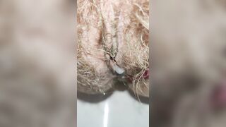 Schoolgirl with small ass but big hairy pussy pissing for you super mega closeup