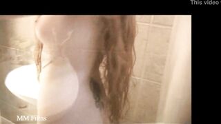 Ariel a teen with long redhair rubbing her wet pussy