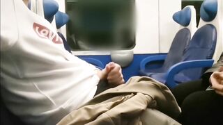 STRANGER looks at my cock and jerks me off in the train