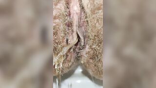 Big Hairy Mommy's Pussy Peeing and little Farting Closeup