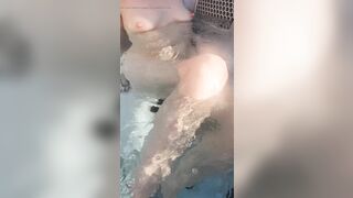 Hotwife and cub are in the hottub naked and rubbing cock