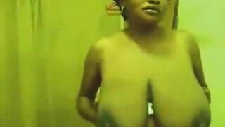 Big titty African lady teasing