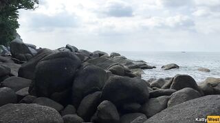 Naked Brunette Masturbates with Oil on a Beach