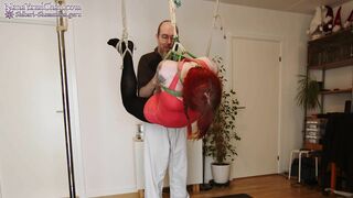 Girl tied up and suspended - Shibari play session