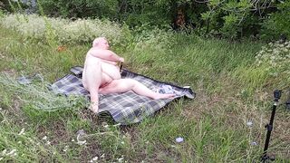 fat girl masturbates pussy with toys in a public place