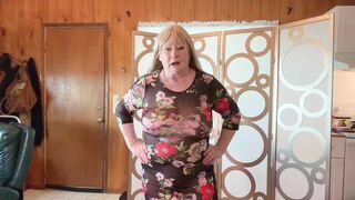 GILF TRIES ON TRANSPARENT FLOWERS DRESS