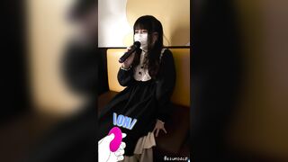 POV Japanese goth girl with remote sex toy in public downtown