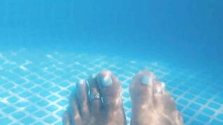 Underwater footsie