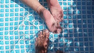 Cleaning the pool while barefoot