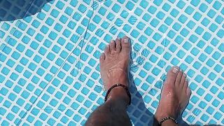 Cleaning the pool while barefoot