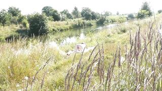 Nude Milf sunbathing on river bank. Random guy watching and filmed on his smartphone. Wild beach. Naked in public. Nudist beach. Doggystyle. Ass. Pussy. Doggy style. POV. Outdoor. Outside. Publicly. Ass milf. Butt. In nature. Without panties. No panties