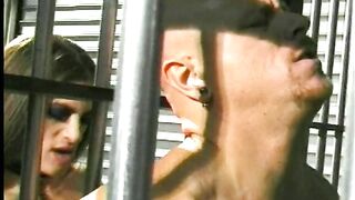 Horny dude gets hard anal fuck in the prison from a sexy babe with big strap on