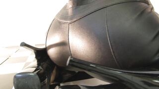 Blonde in Skintight Leather Pants gives POV show in bar