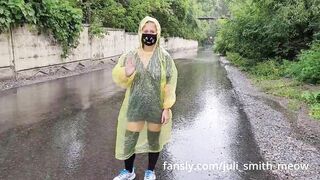 Teen in yellow raincoat flashes pussy outdoors in the rain