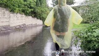 Teen in yellow raincoat flashes pussy outdoors in the rain