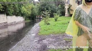 Teen in yellow raincoat flashes pussy outdoors in the rain