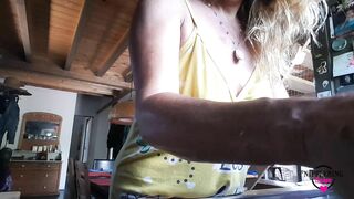 nippleringlover flashing large gauge pierced nipples while cooking in kitchen