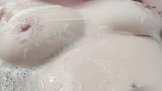 Bath time titties! | Busty amateur babe plays with titts in the bathtub