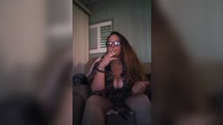 Busty Milf Smoking Cigarette (Cleavage Tease)