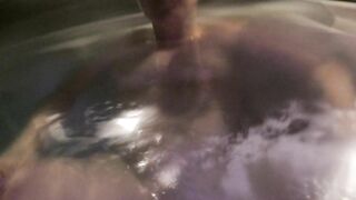 British Milf squirts whilst in hot tub young guy playing with her tight pussy