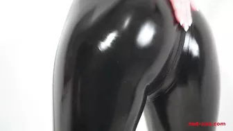 Horny housewife Red XXX masturbates in her latex pants